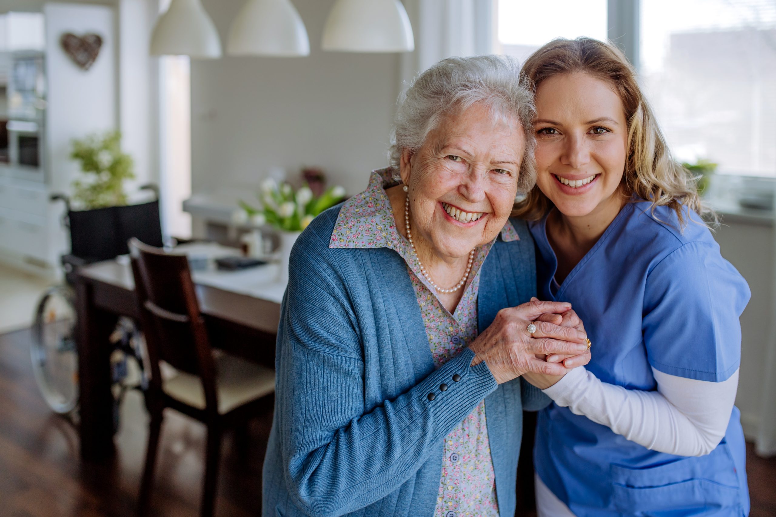 Young,Nurse,Hugging,Her,Senior,Woman,Client.